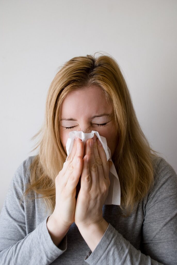 woman, sneeze, blowing nose-698919.jpg