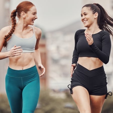 Runner,Women,,Friends,And,Smile,Together,In,City,For,Workout,